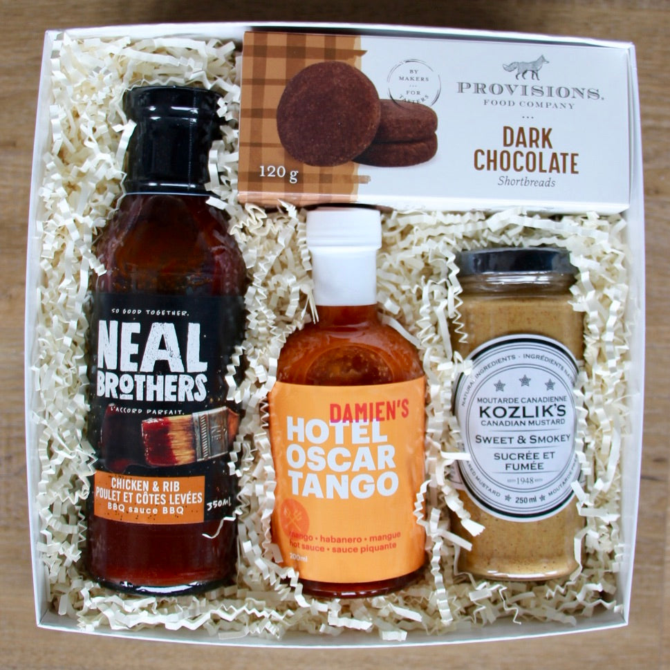 BBQ themed gift box with high quality BBQ sauces, Kozlik's mustard, Damien's hot sauce and Provisions Food Co dark chocolate shortbreads. Perfect little gift for BBQ lovers all year round!