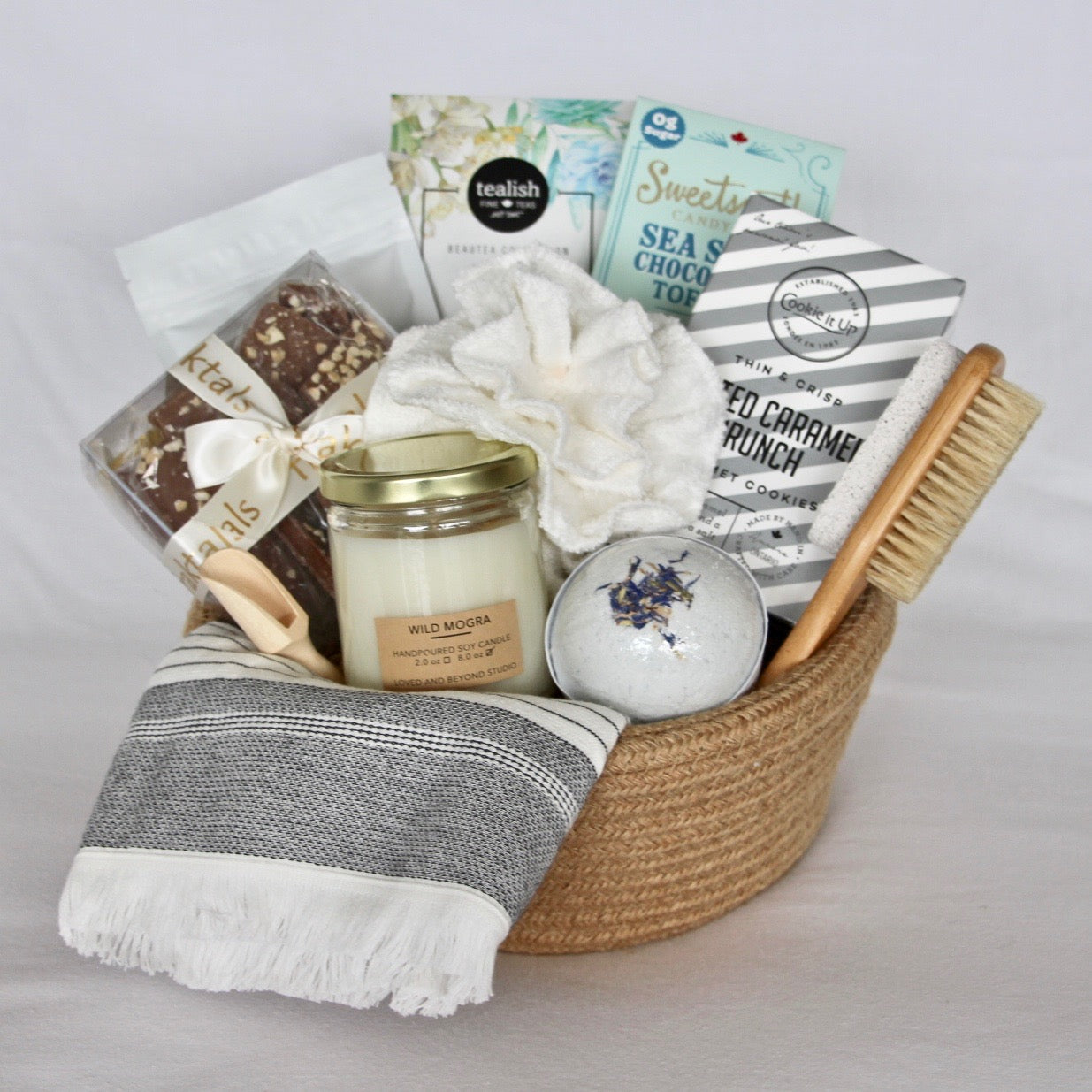 This At-Home Spa Day inspired gift basket was created for that person in your life who could really use some pampering. Filled with Canada's top quality bath products and sweets presented on a beautiful keepsake cotton & jute basket that will be enjoyed by anyone receiving it!  The perfect birthday gift or Mother's day gift