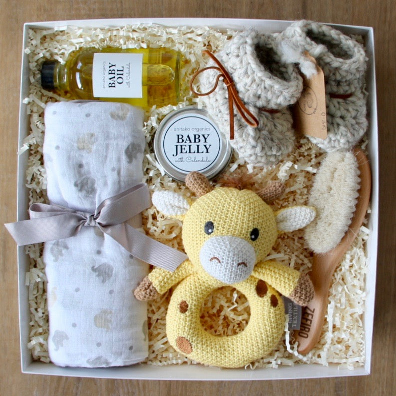 New baby gift set with organic and natural high quality products and adorable hand knitted booties