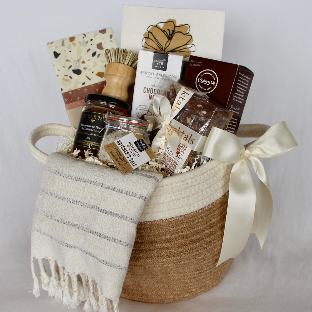 Beautiful housewarming gift basket filled with symbolic and sustainable gift items. Perfect for realtors or mortgage agent's closing gifts or for the loved one who just purchased their first home!