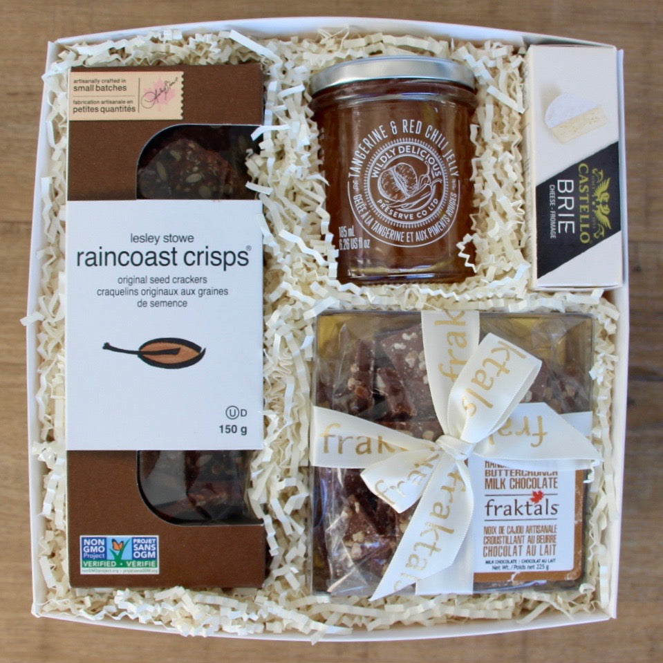 A lovely gourmet gift box filled with artisan crackers, brie cheese, savoury jelly and everyone's favourite treat - Fraktals Belgian milk chocolate butter-brunch! 