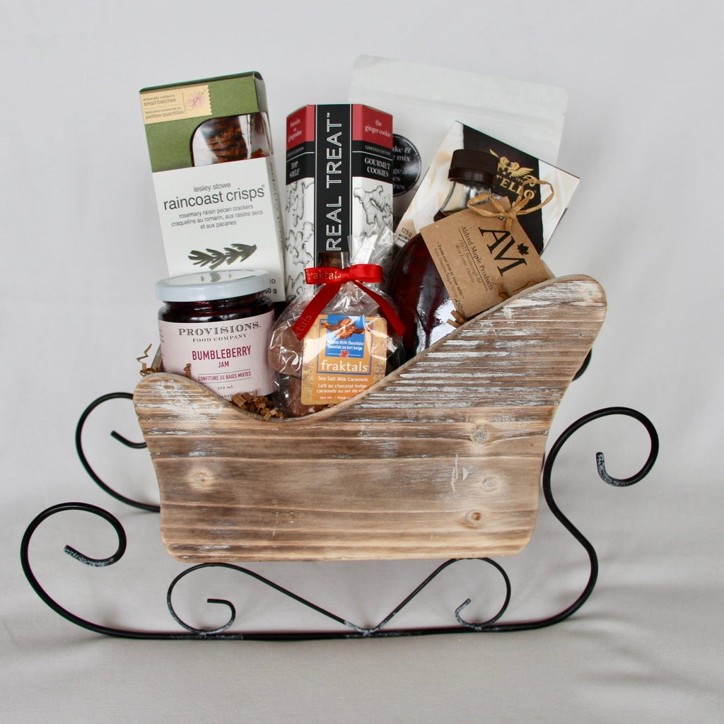 Adorable, festive sleigh is jam packed (pun intended) with all the fixings for a festive breakfast or brunch with the family for the Holidays. The keepsake wood & metal sleigh will remain a cherished decore item they will continue to use every year for the Holidays.