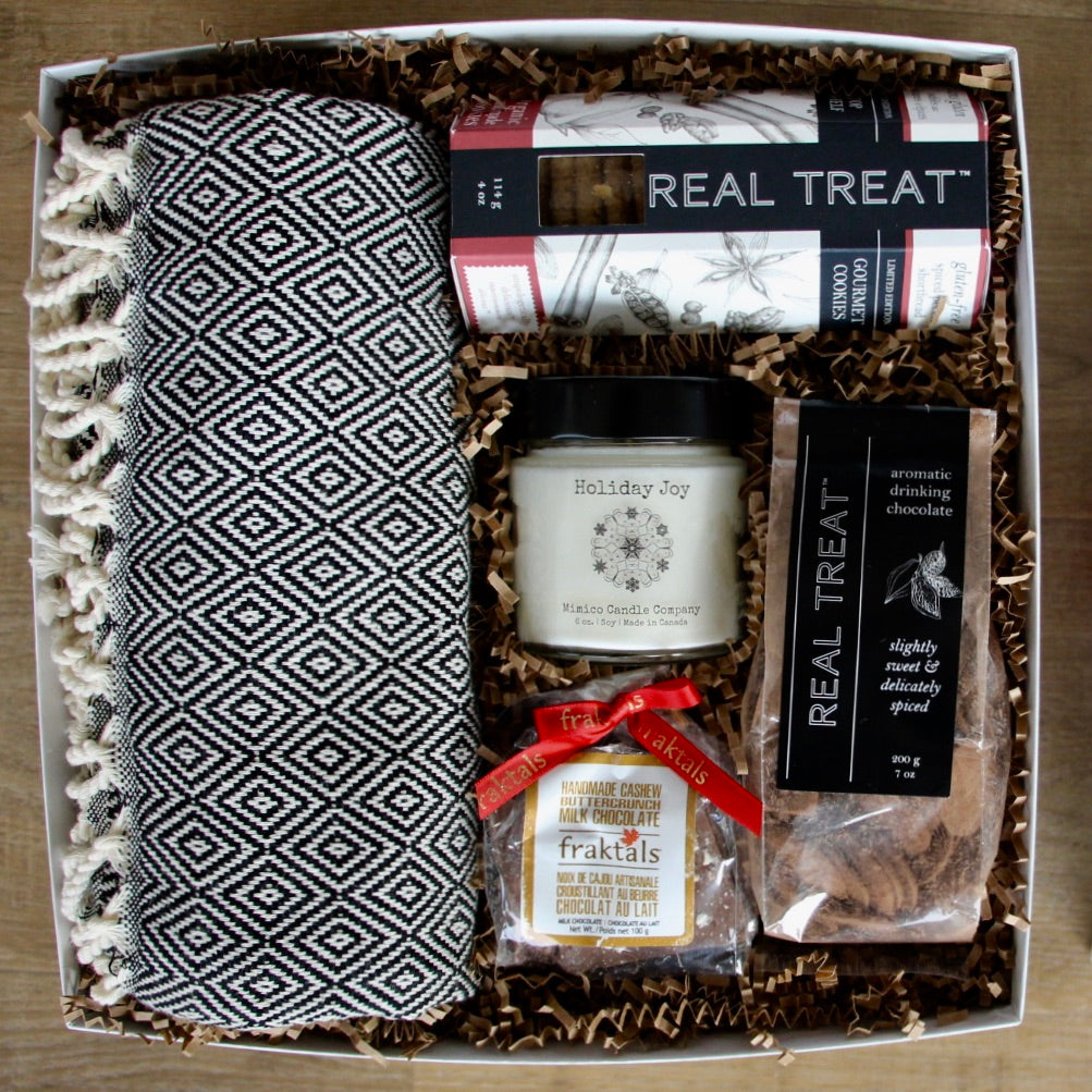 Christmas Holiday gift box with delectable sweets, soy candle and a cozy Turnish throw