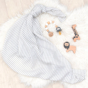 This Grey Stripe muslin blanket is timeless and long-lasting. Made of 100% premium cotton, our blankets are incredibly soft, lightweight and breathable. 